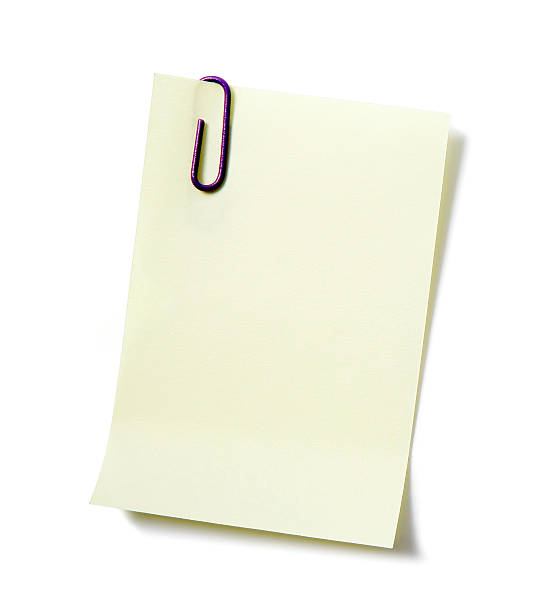 istock White piece of paper held by a paperclip 182458471