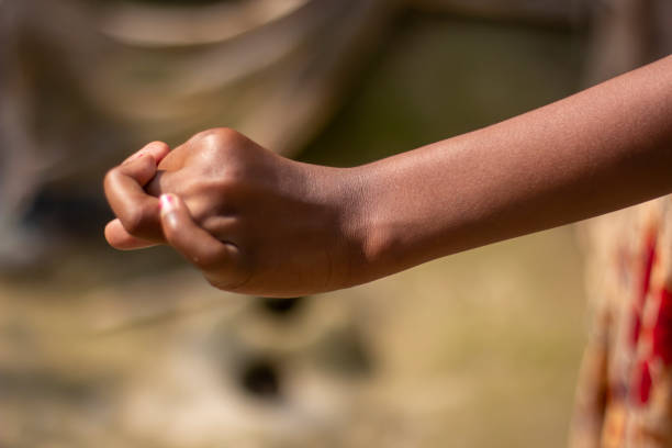 istock A man's hands are clenched into fists and blurred background 1824585438