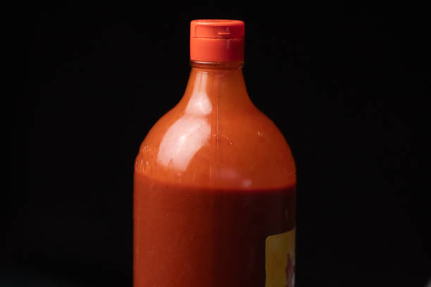 Hot sauce battle top copy space image on black background