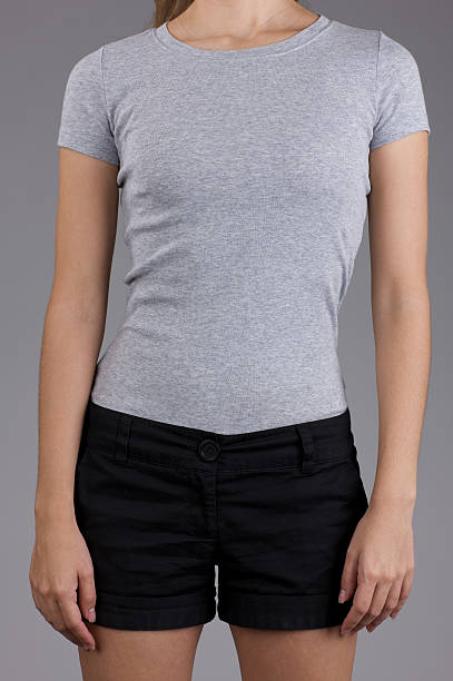 istock Young woman's torso with blank gray shirt 182458603