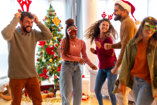 istock Friends dancing while celebrating New Year at home 1824587087