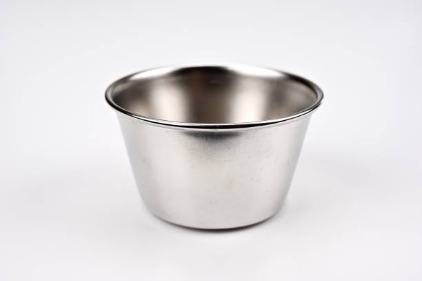 istock There is one small stainless steel cup. 1824589804