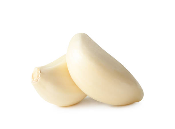 istock Fresh peeled garlice cloves isolated on white background with clipping path 1824592552