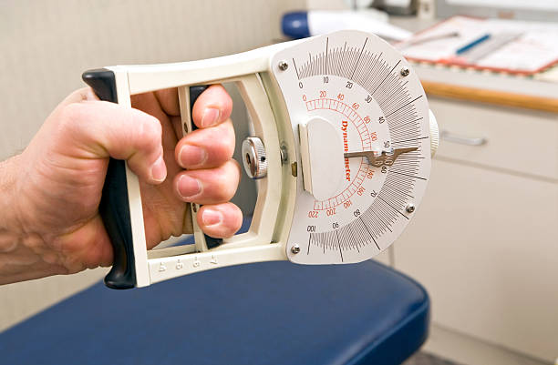Dynamometer Hand Grip Strength Test  gripping stock pictures, royalty-free photos & images