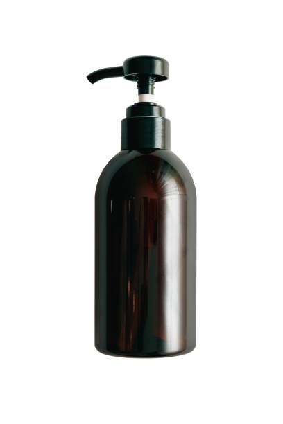 istock Plastic brown bottle with dispenser pump isolated on white background. 1824603893