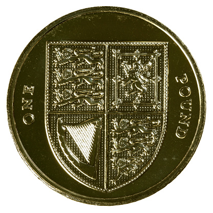 Close up of reverse side of UK one pound coin. Isolated on white. Cropped very close to coin to give maximum size required to size downloaded ratio.