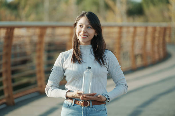 istock Latina beauty with PET bottle in hand 1824615818