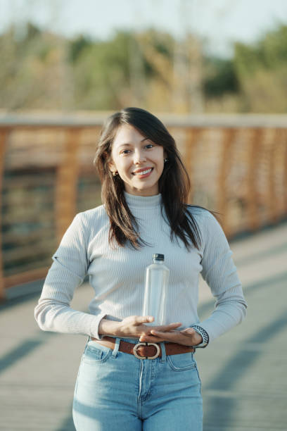 istock Latina beauty with PET bottle in hand 1824615830