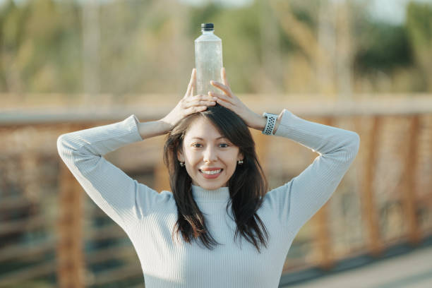 istock Latina beauty with PET bottle in hand 1824616441