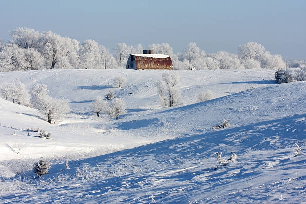 istock Barn and Frosty Woods Across Valley 182461947