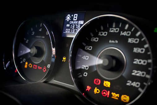 Speedometer and tachometer with dashboard control icons