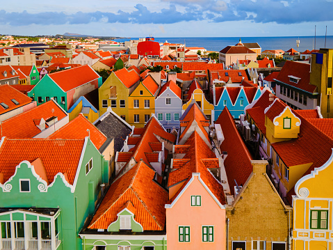 Willemstad, Curacao Dutch Antilles. Colorful Buildings attract tourists from all over the world. Blue sky sunny day Curacao Willemstad, close up of colorful houses of Curacao