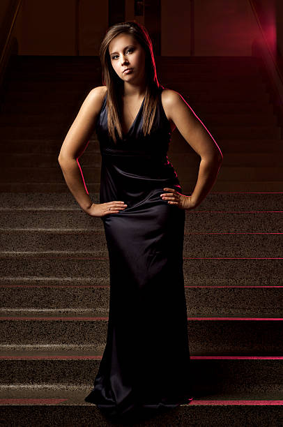 istock Haute Coutour Pose with red light in back 182462625