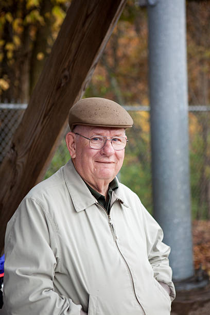 istock Grandfather outside at a sporting event 182462738