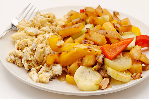 istock plate of stir fry vegetables and eggs 182462932