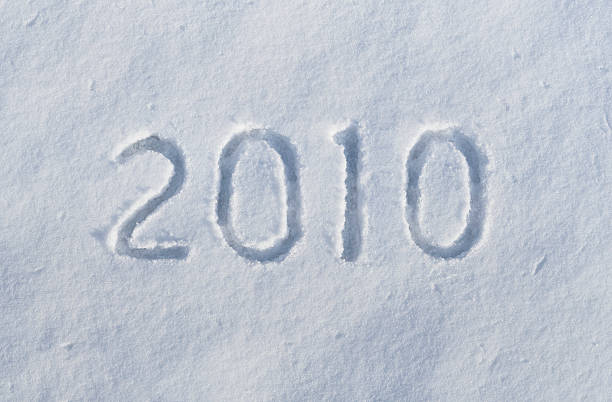 Year 2010 written in snow stock photo