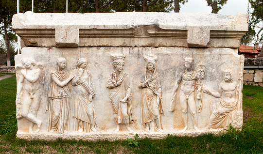 Isparta, Turkey - August 25, 2022: Archaeological artifacts found in the district are exhibited in Yalvaç Museum. Part of a sarcophagus exhibited in the museum.