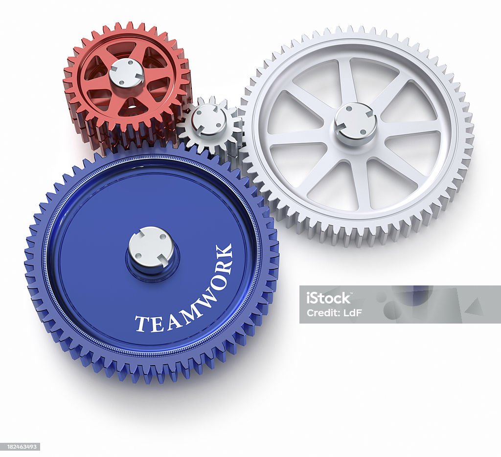 Main gear in an abstract machine Gears isolated on white with main gear red and TEAMWORK writing.Clipping path included. Abstract Stock Photo