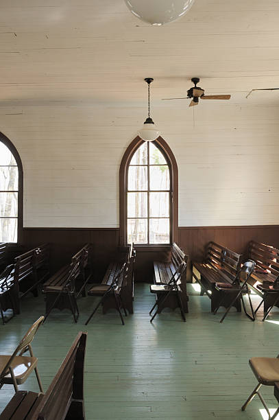 istock Old church with pews 182463511