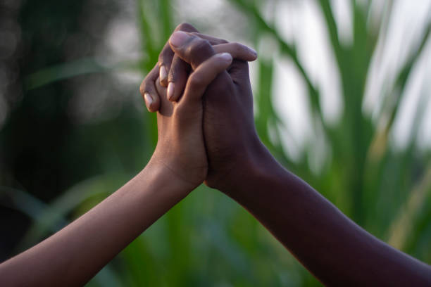 istock A man holding his hands together and blur background 1824640186