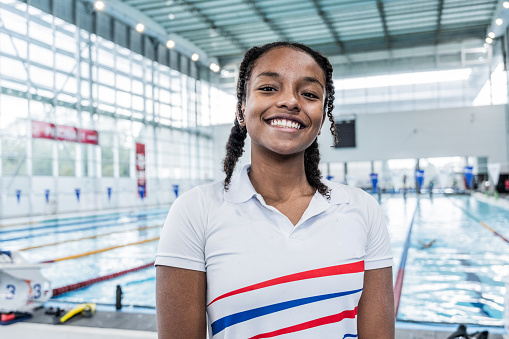 Portrait of a teenage girl at swimming school