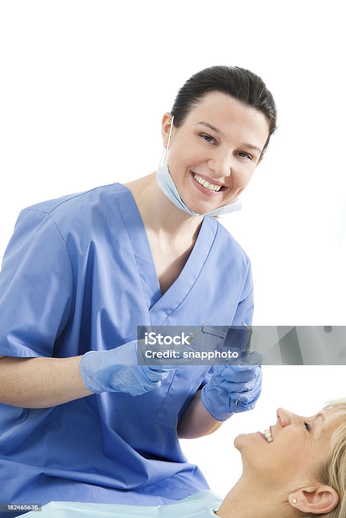 Female Dentist or Dental hygienist with Patient People 30-34 Years Stock Photo