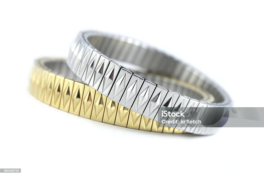 Braceletes de prata e ouro sobre branco - Royalty-free Pulseira Foto de stock