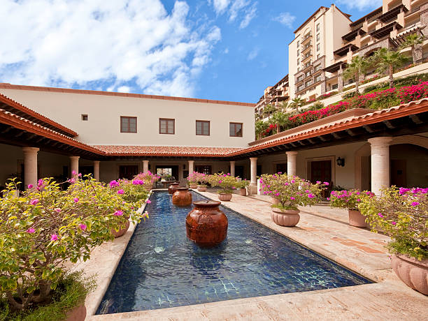 Mediterranean Style Courtyard and Pool with Fountains stock photo