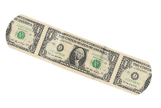 un dólar bandaid - adhesive bandage currency finance repairing fotografías e imágenes de stock