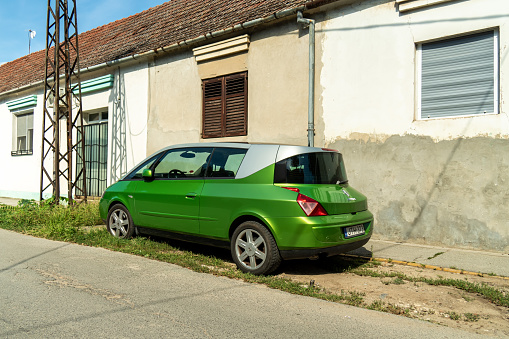 Rare, one of 8000 produced by Matra eccentric unusual design minivan coupe  Renault Avantime in green color is parked in Subotica 01.09.2023