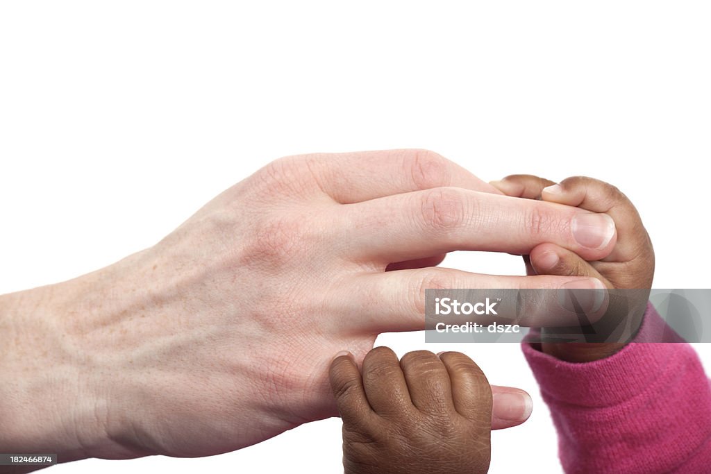 mother and adopted baby daughter hold hands 25-29 Years Stock Photo