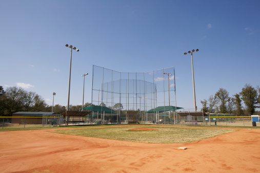 Baseball field with blue sky.