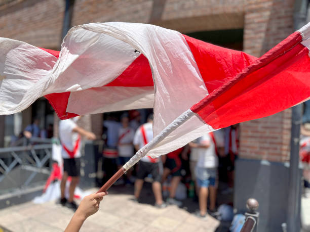 istock Large red and white football flag waving 1824676844
