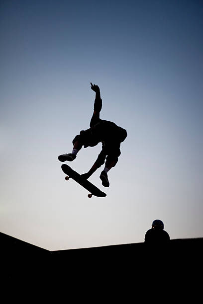 istock Silhouette of Skateboarder on Ramp 182467839