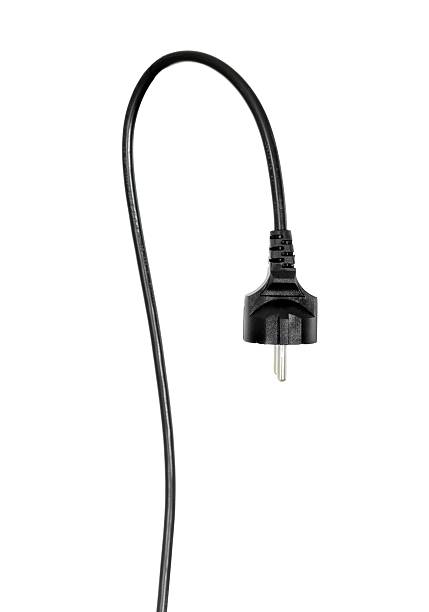 Hanging black electric cable with plug isolated on white hanging european plug and cable on white two pin plug stock pictures, royalty-free photos & images