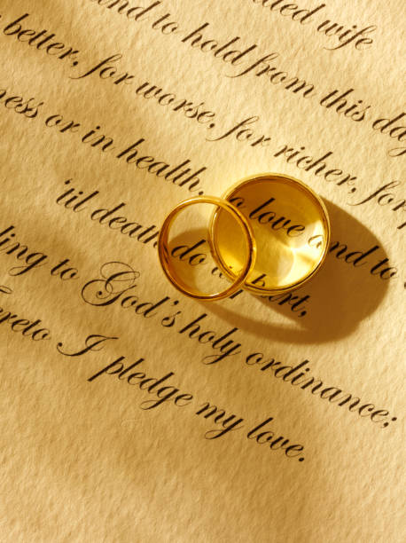 istock Two Wedding Rings and Traditional Marriage Vows 182468132
