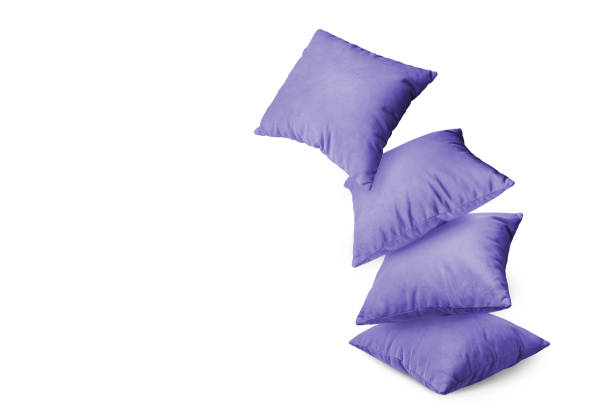 istock Stack of purple pillows isolated on white background 1824682372