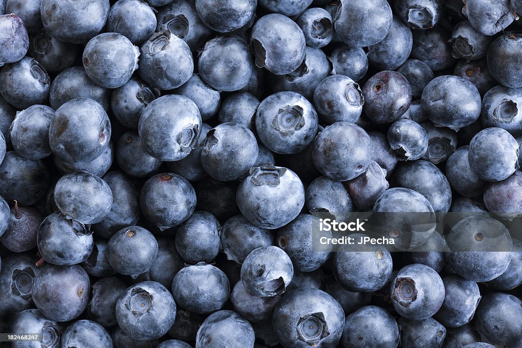 Full frame Close up Background Blueberries, Large Group of Objects "Full frame Close up of BlueberriesFor More Great Edible Options, Go to this lightbox!" Blueberry Stock Photo