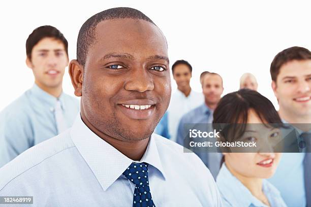 African American Business Man With Colleagues At The Back Stock Photo - Download Image Now