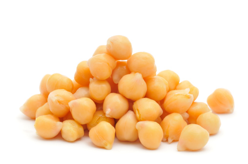 A pile of Chick Peas isolated on a white background.