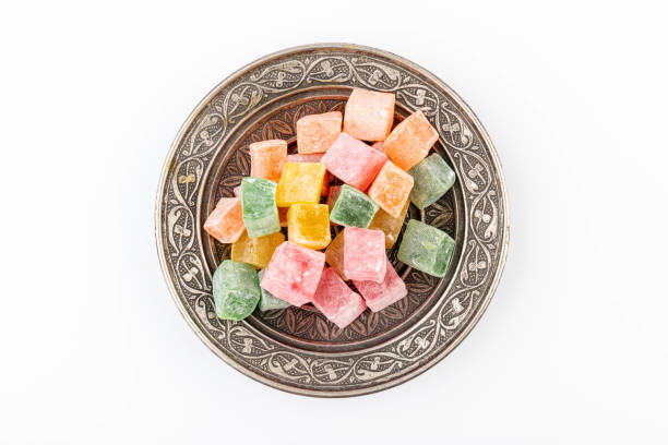 turkish delight on authentic plate isolated on white background - turkish delight imagens e fotografias de stock