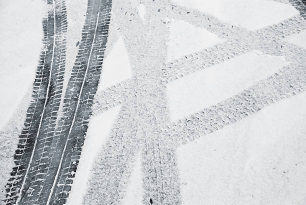 istock Tire tracks in the fresh snow 182470353