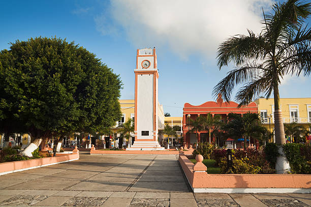Clock Tower of Plaza del Sol, San Miguel, Cozumel, Mexico "Subject: Clock Tower of Plaza del Sol, San Miguel, the town's central plaza of Cozumel, Mexico." san miguel de cozumel stock pictures, royalty-free photos & images
