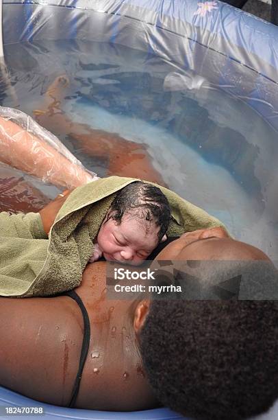 Baby Daywater Birth Mother And Newborn Stock Photo - Download Image Now - Water Birth, Baby - Human Age, 0-11 Months