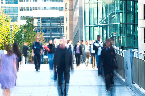 istock Group of Blurred People Walking in a Financial District 182471000