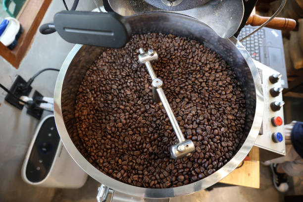 istock Coffee beans being roasted in a roasting machine in a coffee shop 1824715144