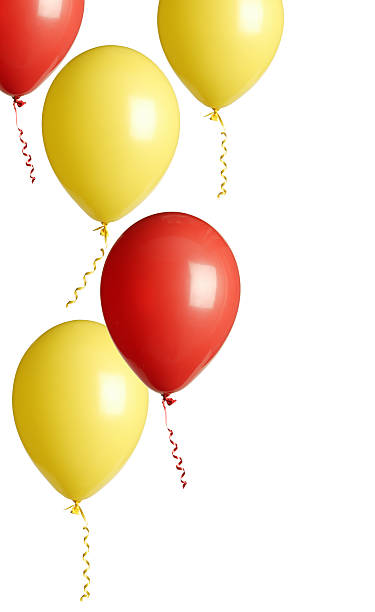 istock red and yellow party balloons isolated on white 182471644