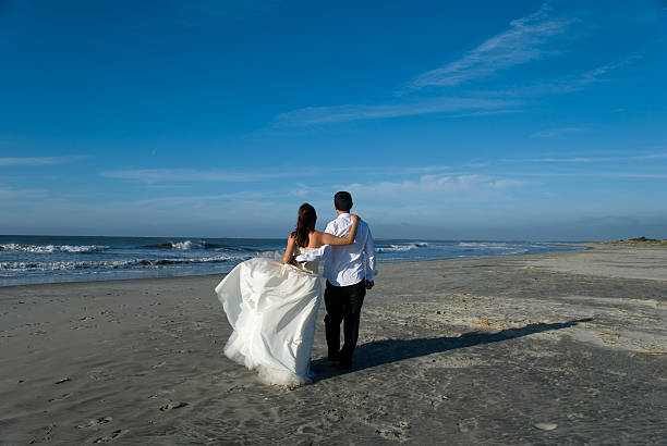 istock Newlywed couple on the beach 182471838