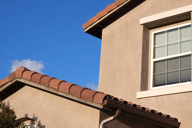 istock Stucco Home Exterior and Blue Sky 182471937