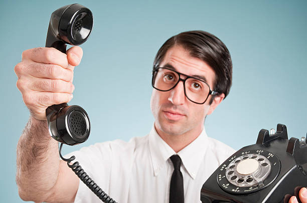 istock Nerdy Office Worker With Vintage Telephone 182472144
